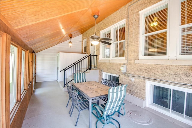 exterior space featuring ceiling fan, lofted ceiling, and wooden ceiling