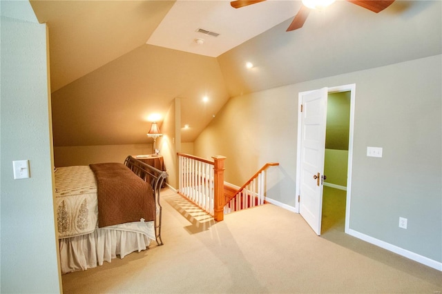 bedroom featuring lofted ceiling, carpet floors, and ceiling fan