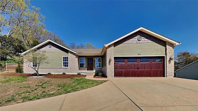 view of front of property featuring a garage