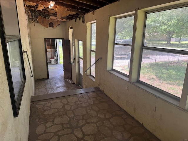 view of unfurnished sunroom