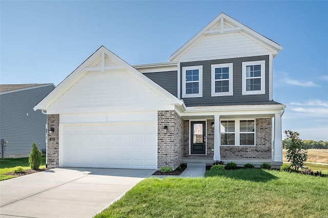 view of front facade with a garage and a front lawn