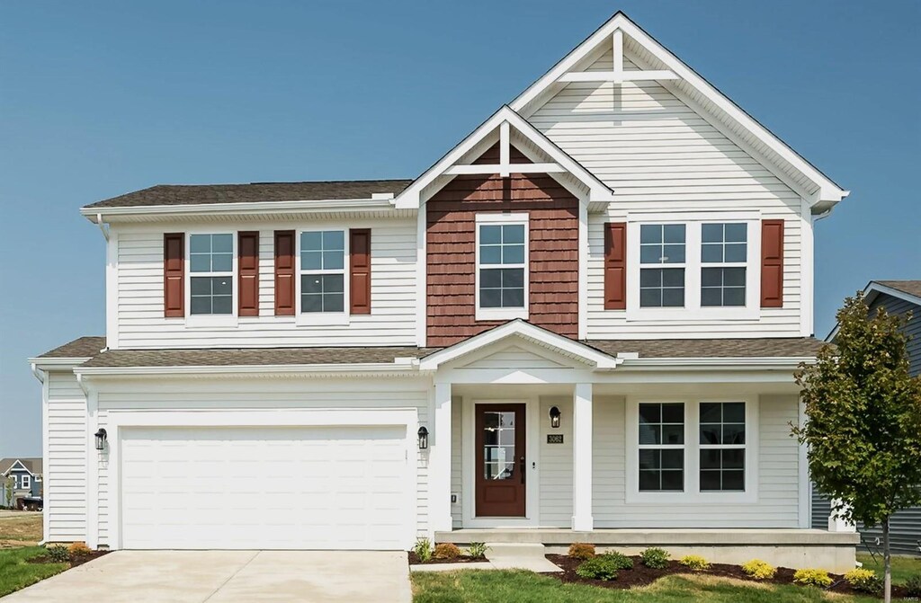 view of front of property with a garage