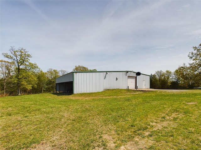 exterior space featuring an outdoor structure and a garage