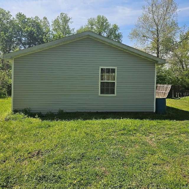 view of home's exterior featuring a lawn