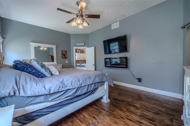 bedroom featuring dark hardwood / wood-style floors and ceiling fan