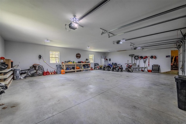 garage featuring a garage door opener