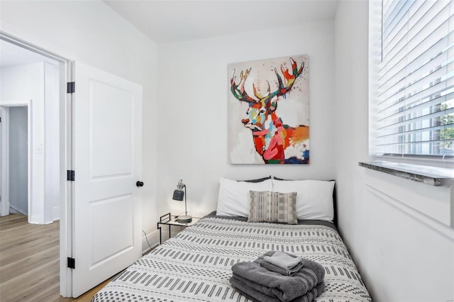 bedroom featuring light hardwood / wood-style floors