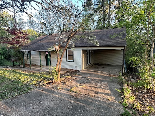 view of front of house with a carport