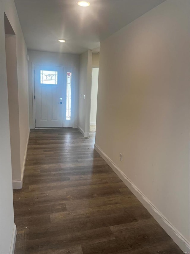 doorway to outside featuring dark hardwood / wood-style floors