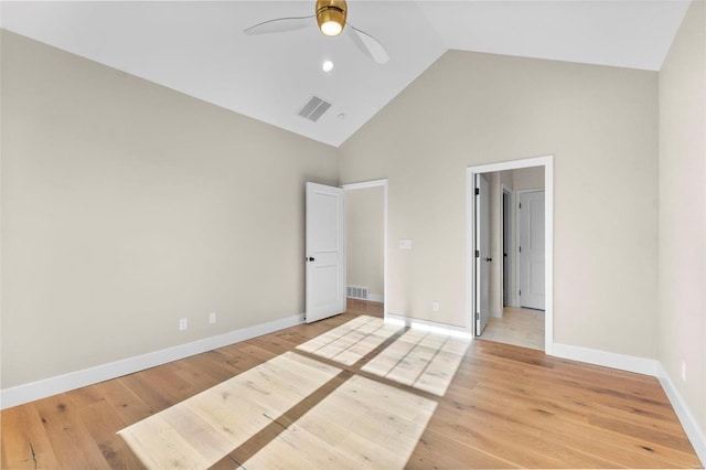 unfurnished bedroom with ceiling fan, light hardwood / wood-style flooring, and high vaulted ceiling