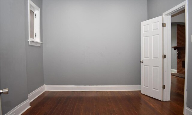 unfurnished room featuring hardwood / wood-style floors