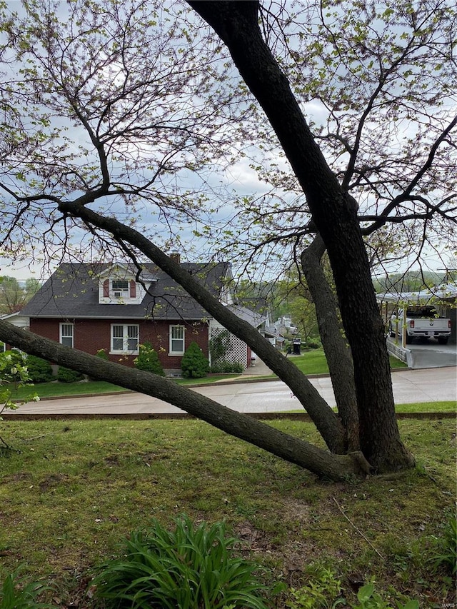 exterior space featuring a lawn