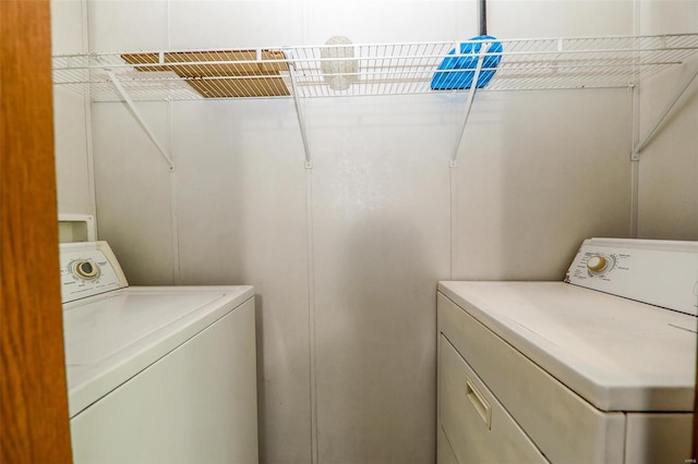 laundry area with washer and dryer