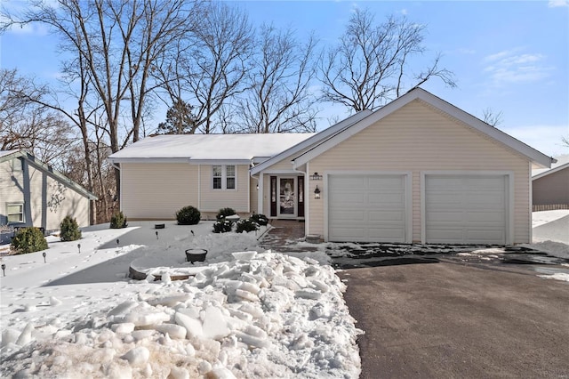 single story home with a garage