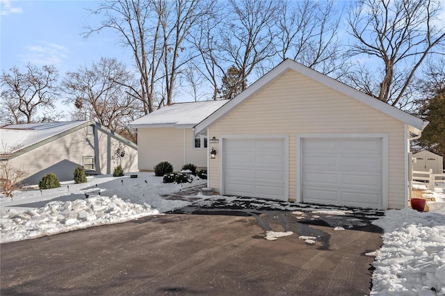 view of snow covered garage