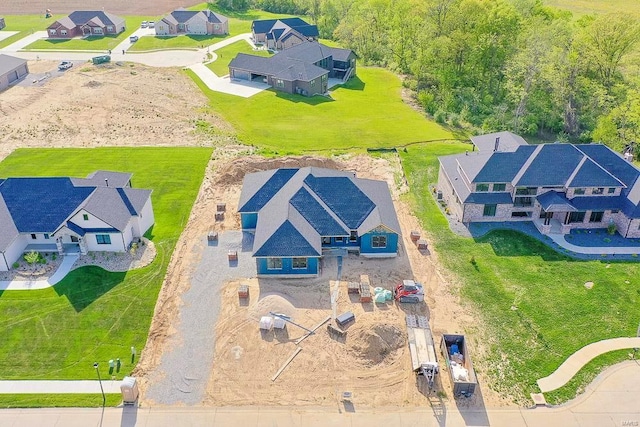 birds eye view of property with a residential view