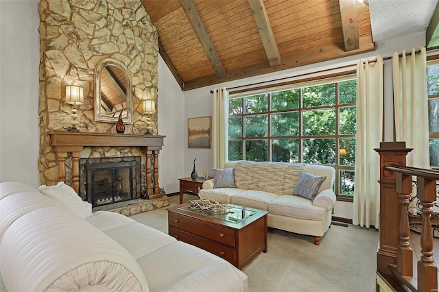 carpeted living room with a stone fireplace, beamed ceiling, wood ceiling, and high vaulted ceiling