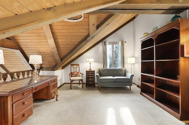 carpeted home office with vaulted ceiling with beams and wooden ceiling