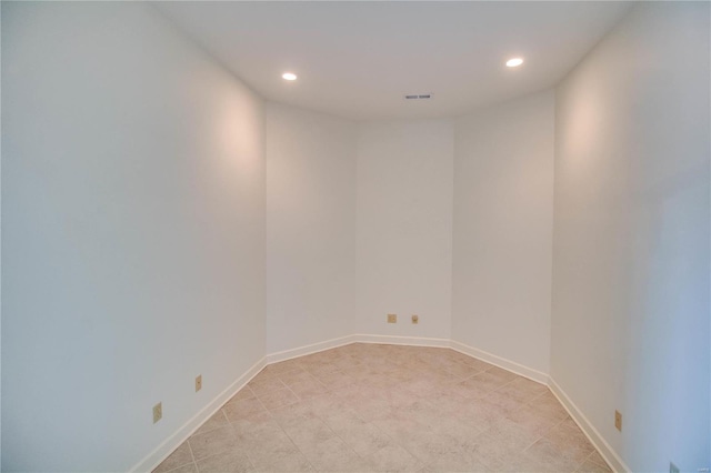 empty room with light tile flooring