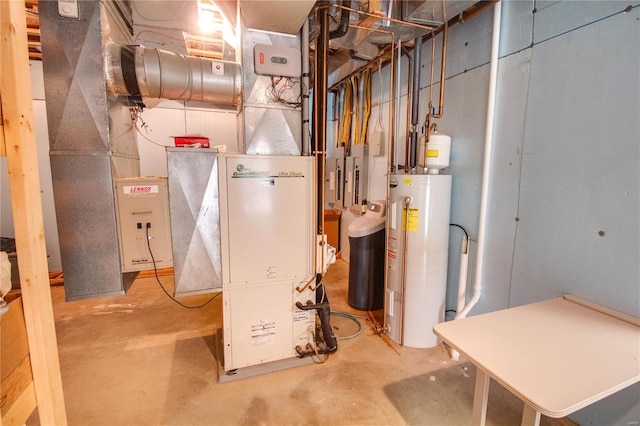 utility room featuring water heater