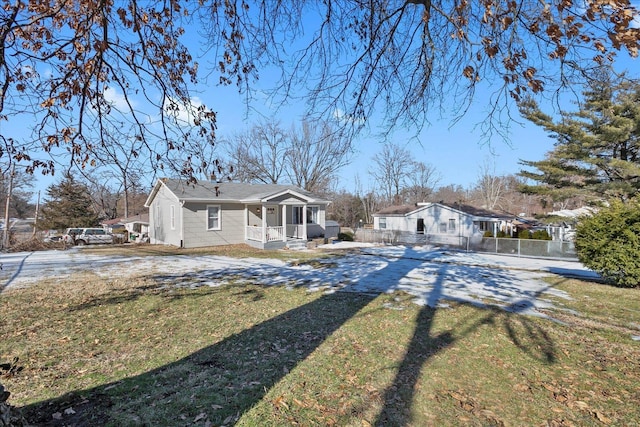 ranch-style home with a front lawn