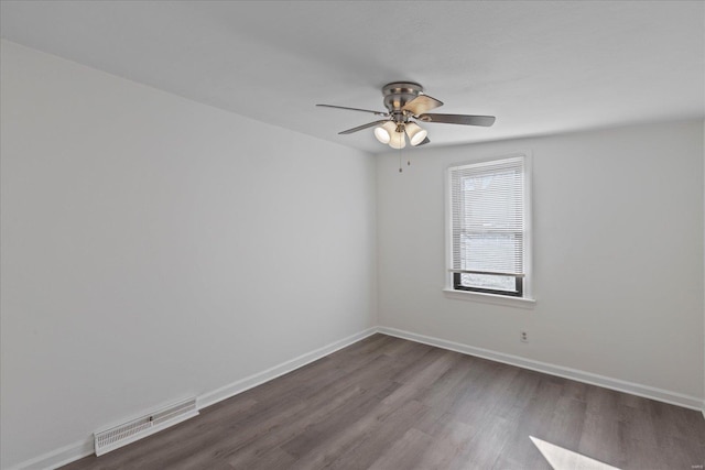 unfurnished room with hardwood / wood-style floors and ceiling fan