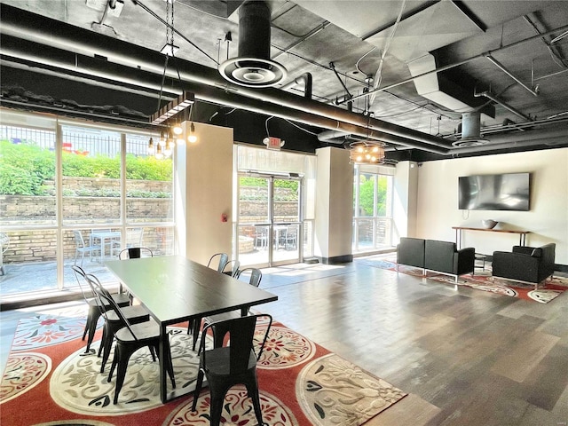 dining area featuring hardwood / wood-style floors