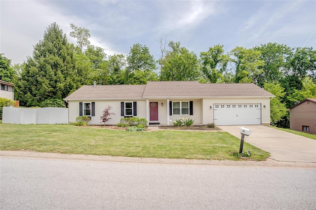 ranch-style home with a garage and a front yard