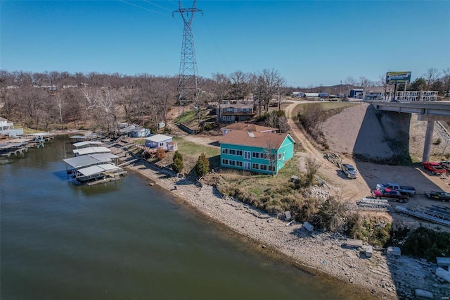 birds eye view of property featuring a water view