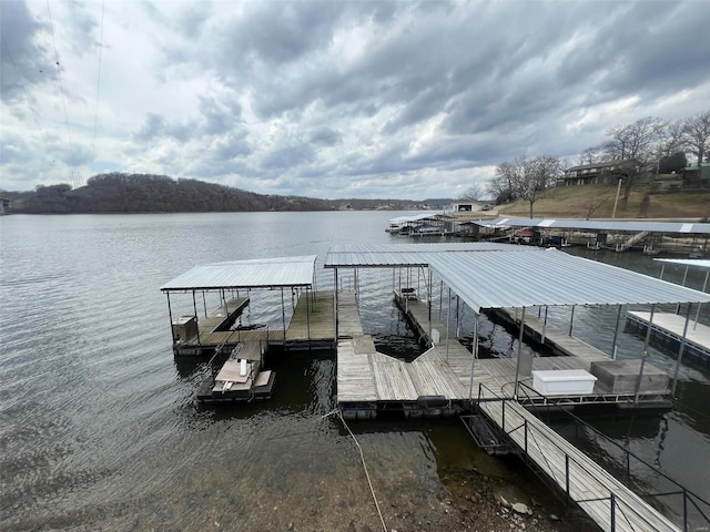 dock area featuring a water view