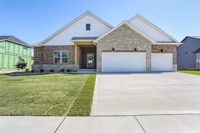 view of front of house with a front yard and a garage