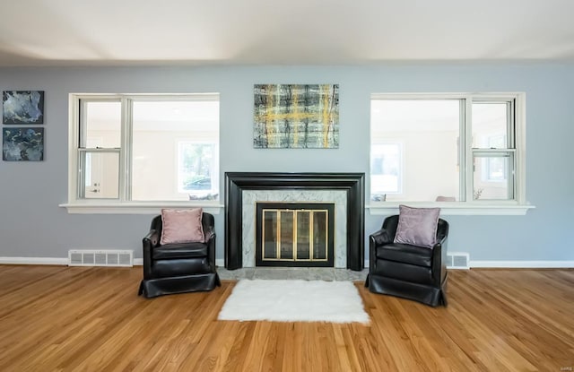 living area with wood-type flooring