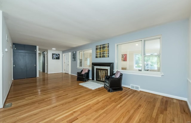 unfurnished room with wood-type flooring