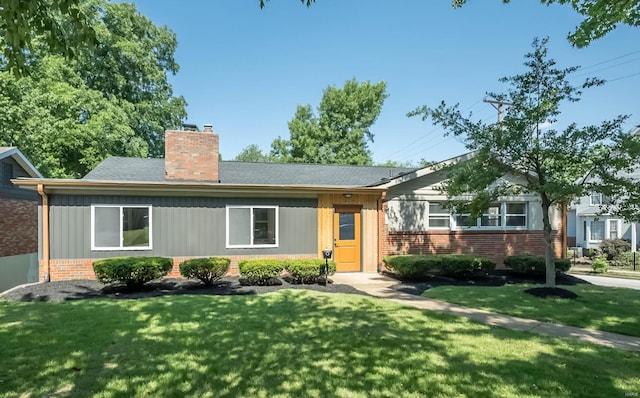 ranch-style house with a front yard