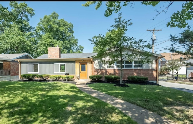 ranch-style house with a front yard