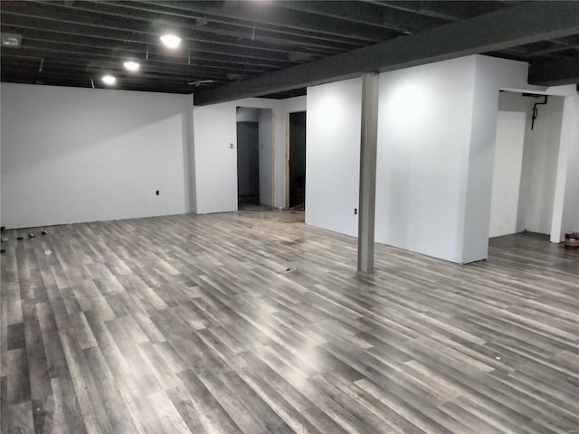 basement with wood-type flooring