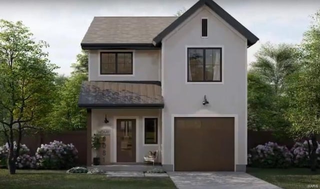 view of front of home featuring a garage