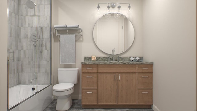 full bathroom featuring shower / bath combination with glass door, vanity, and toilet