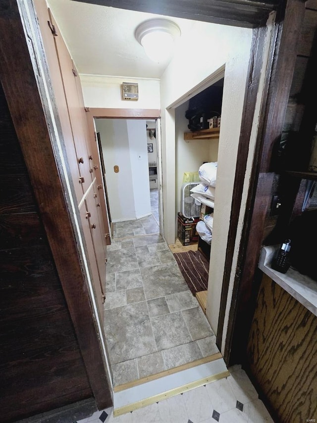 hallway with light tile flooring