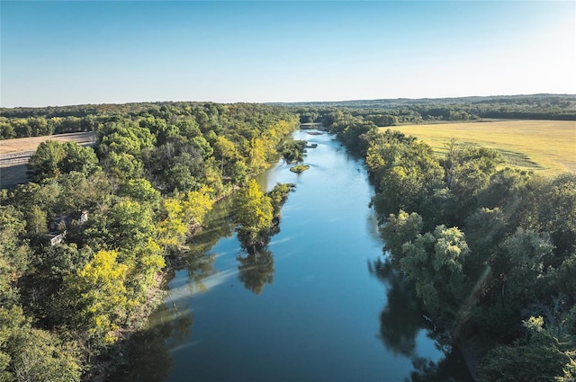 aerial view featuring a rural view and a water view