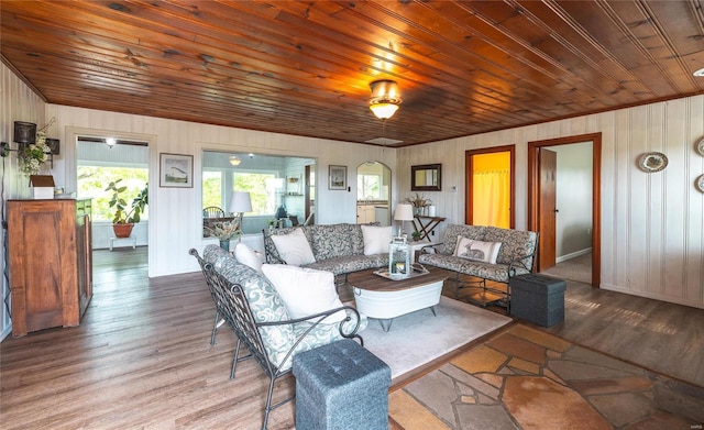 living room featuring hardwood / wood-style flooring and wood ceiling