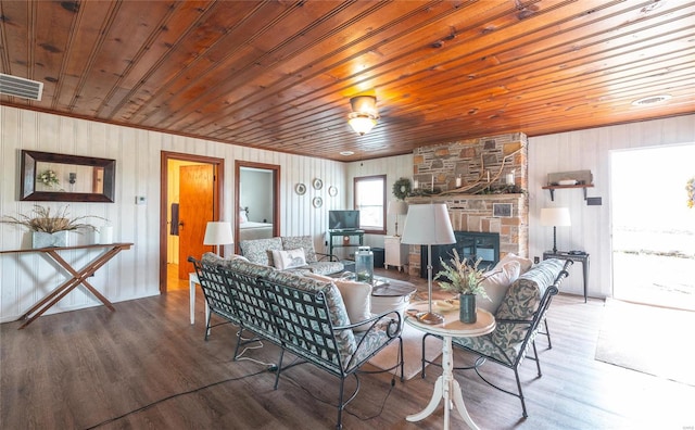 living room with wood ceiling and wood-type flooring