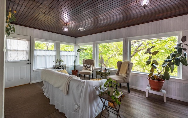 sunroom featuring wood ceiling