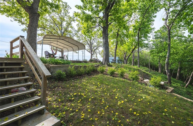 view of yard with a carport