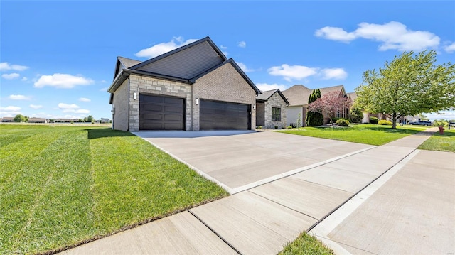 view of front of property with a garage and a front yard