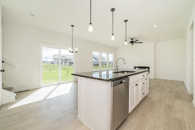 kitchen with white cabinets, sink, a center island with sink, light hardwood / wood-style flooring, and dishwasher