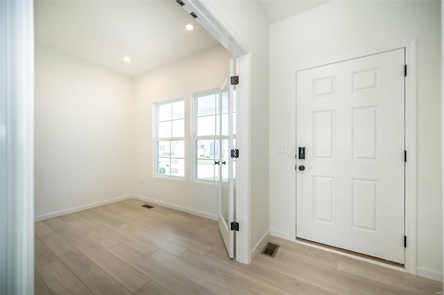 entrance foyer featuring light hardwood / wood-style floors