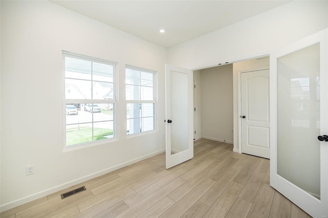 interior space with light hardwood / wood-style floors