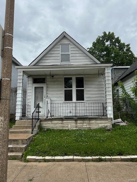 bungalow-style home with a porch