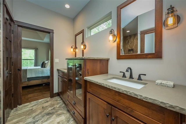 bathroom with vanity and tile flooring